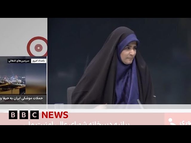 Debris falls in Iranian state TV studio during live broadcast as Israeli strikes continue | BBC News